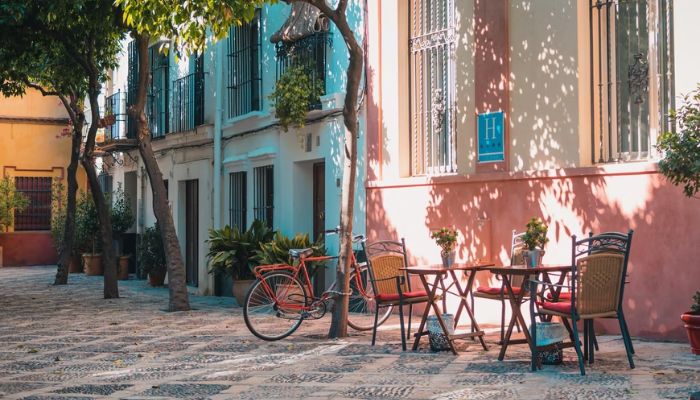 Cycling might not be the best way to move around the old streets of Seville because of the pavements, but this bike sure has a charm.— Unsplash