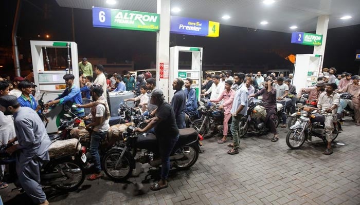 People wait their turn to get fuel at a petrol station, in Karachi, Pakistan June 2, 2022. Picture taken June 2, 2022. — Reuters/File