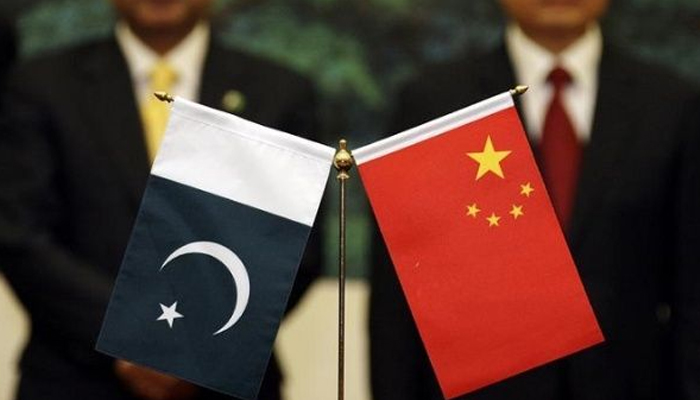 In this Reuters file photo, flags of Pakistan (left) and China can be seen.