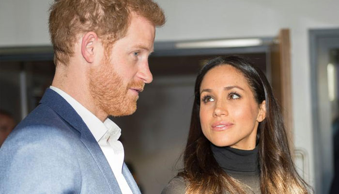 Meghan Markle fears Prince Harry will be lured back into Royal Family