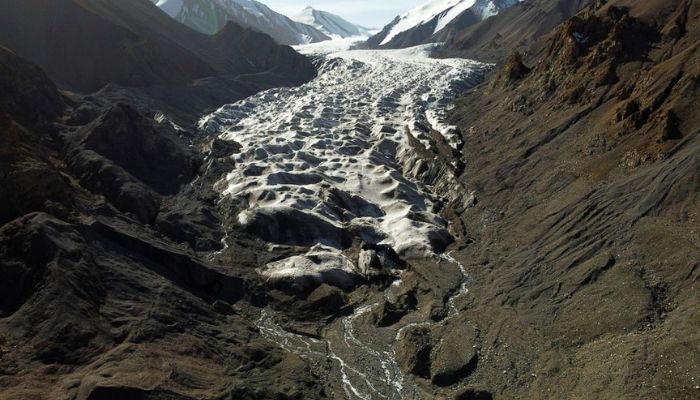 Meltwater from the Laohugou No. 12 glacier, flows though the Qilian mountains, Subei Mongol Autonomous County in Gansu province, China, September 27, 2020. Reuters