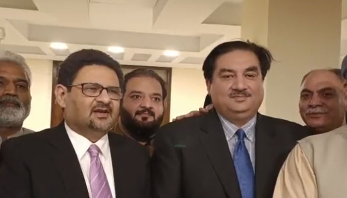 Finance Minister Miftah Ismail and Power Minister Khurrum Dastagir Khan announce withdrawal of fixed tax regime. — Screengrab/Twitter