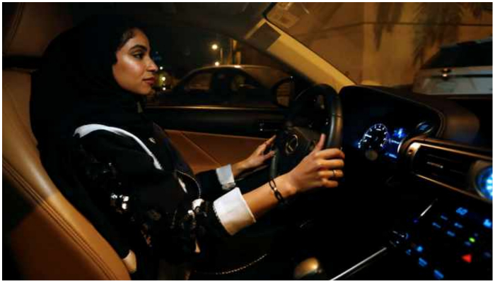 Representational image of a woman driving a car. — Reuters.