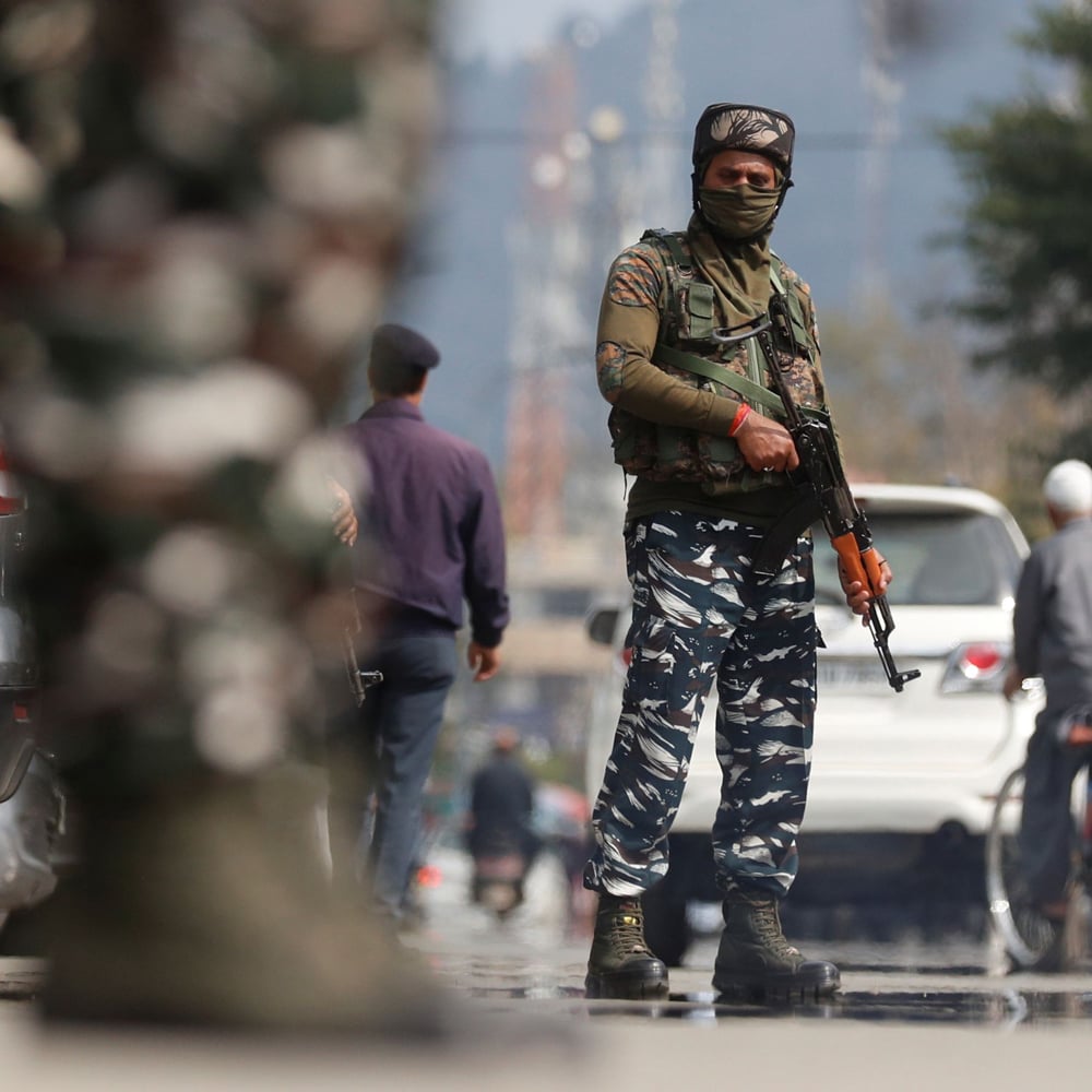 Indian Central Reserve Police Force (CRPF) personnel stand guard on a street in Srinagar, October 12, 2021. — Reuters