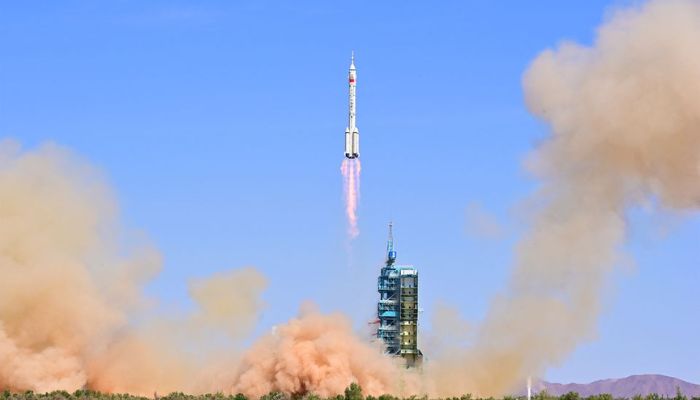 The Long March-2F carrier rocket, carrying the Shenzhou-14 spacecraft and three astronauts, takes off from Jiuquan Satellite Launch Center for a crewed mission to build Chinas space station, near Jiuquan, Gansu province, China June 5, 2022.  — Reuters