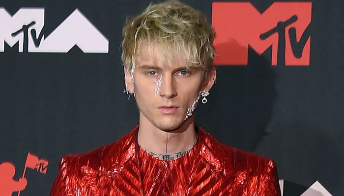 Machine Gun Kelly reacts to his tour bus being painted with homophobic slur