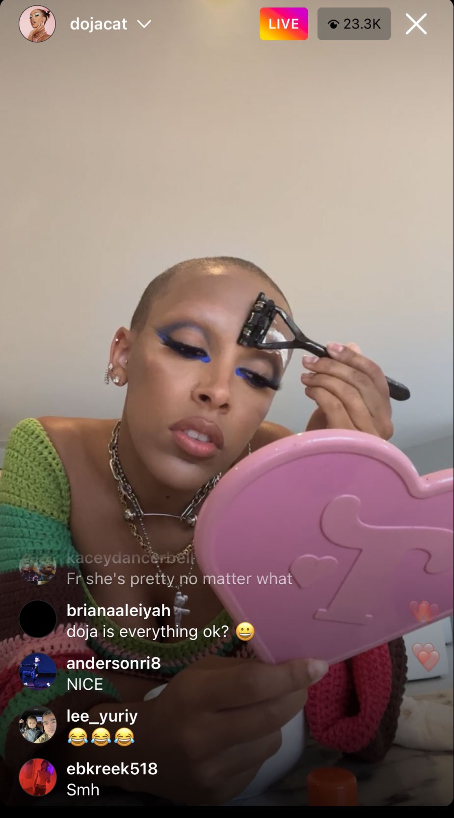 Doja Cat dishes on her new shaved head' look