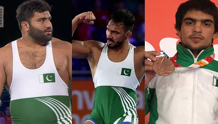 Pakistani wrestlers: (from left) Zaman Anwar, Inam Butt and Inayatullah.  Photo: Geo News/File