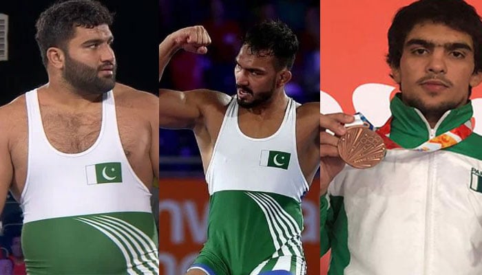 Pakistani wrestlers: (from left) Zaman Anwar, Inam Butt andInayatullah. Photo: Geo News/File