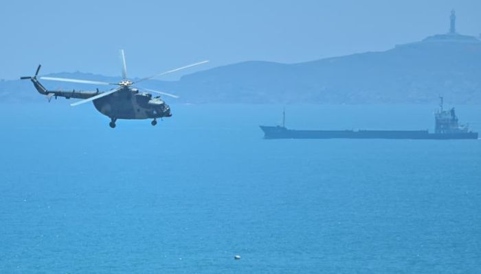 Chinese helicopter during military drill in Taiwan strait - AFP