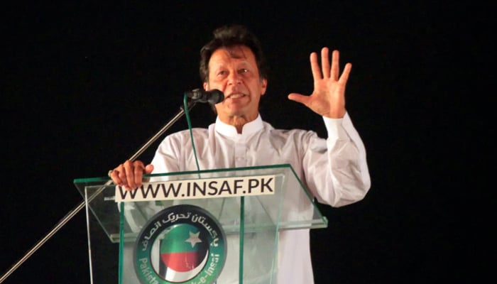 PTI Chairman Imran Khan addresses supporters in Lahore in this undated photo. — Reuters/File