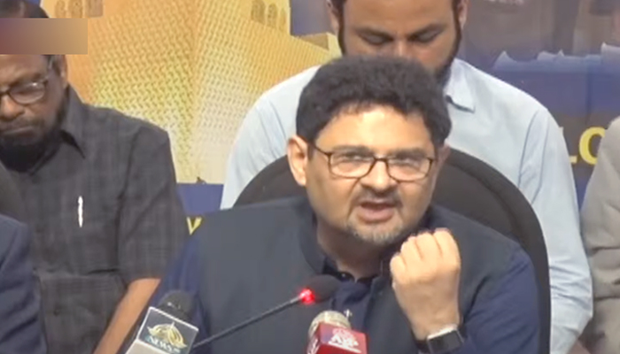 Finance Minister Miftah Ismail addresses a press conference after holding a meeting with the Karachi Chamber of Commerce and Industry (KCCI) in Karachi, on August 6, 2022. — YouTube/PTVNewsLive