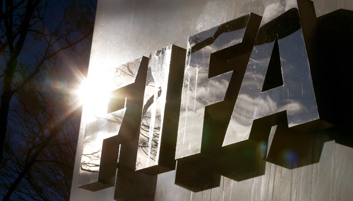 The sun is reflected in FIFAs logo in front of FIFAs headquarters in Zurich, Switzerland November 19, 2015. — Reuters