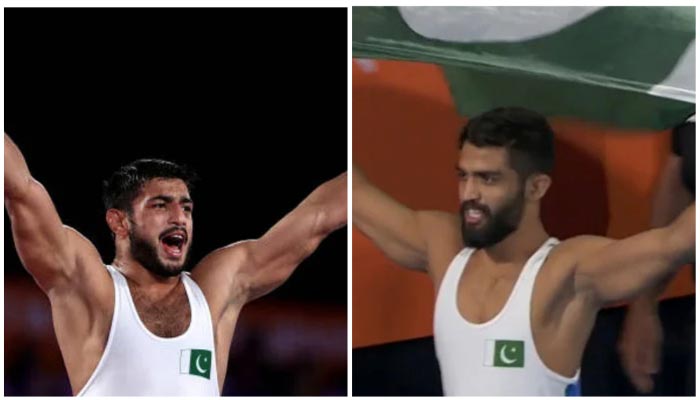 Pakistani wrestlers Mohammad Sharif Tahir and Ali Asad. — Twitter/File