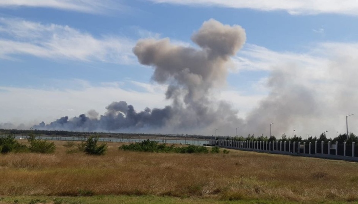 Smoke rises after explosions were heard from the direction of a Russian military airbase near Novofedorivka, Crimea. — Reuters