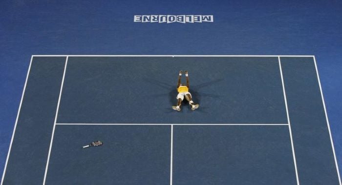 Serena Williams reacts after winning match point against Belgiums Justine Henin in the womens singles final at the Australian Open tennis tournament in Melbourne January 30, 2010. — Reuters