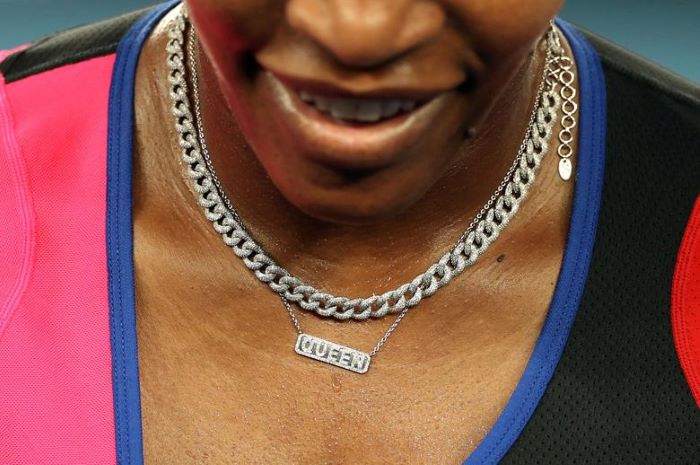 Serena Williams of the U.S. wearing a necklace reading Queen during her quarter final match against Romanias Simona Halep during the Australian Open in Melbourne, Australia, February 16, 2021. — Reuters