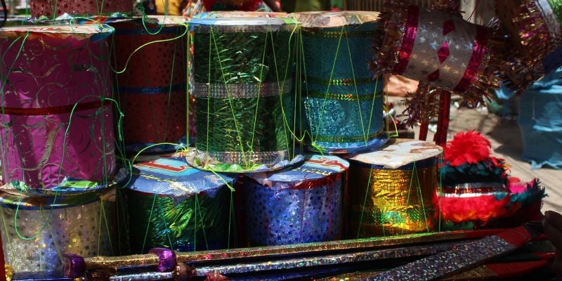 Vibrant toys set up on a cart during Muharram - Image by author