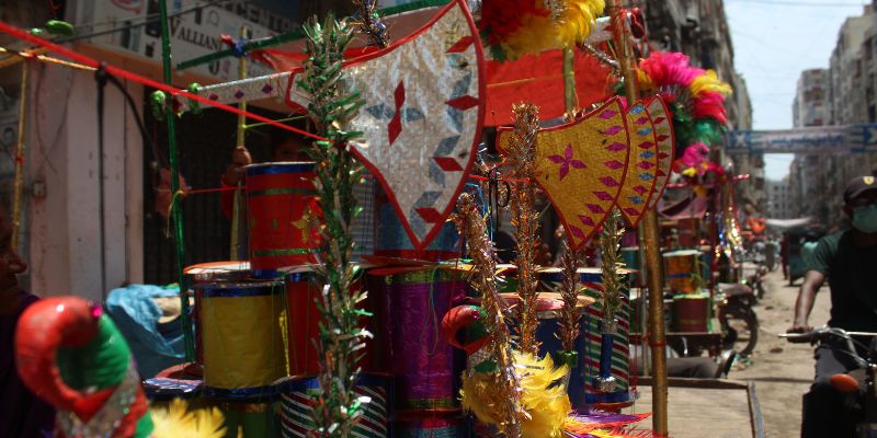 Decorative wooden axes sold in different colours - Image by author