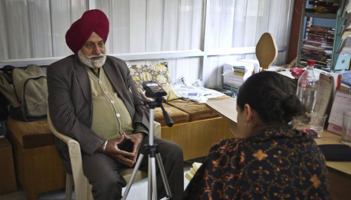 Guneeta Singh Bhalla, founder of The 1947 Partition Archive, interviewing a Partition survivor in Amritsar, India. Picture courtesy: Thomson Reuters Foundation/Metha Daoheung