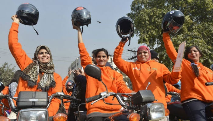In this undated photo, women are seen taking part in the Women on the Wheels programme. Geo News