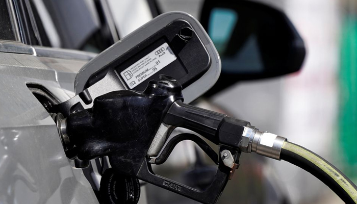 A gas pump is inserted inside an Audi vehicle at a Mobil gas station in Beverly Boulevard in West Hollywood, California, US, March 10, 2022. — Reuters