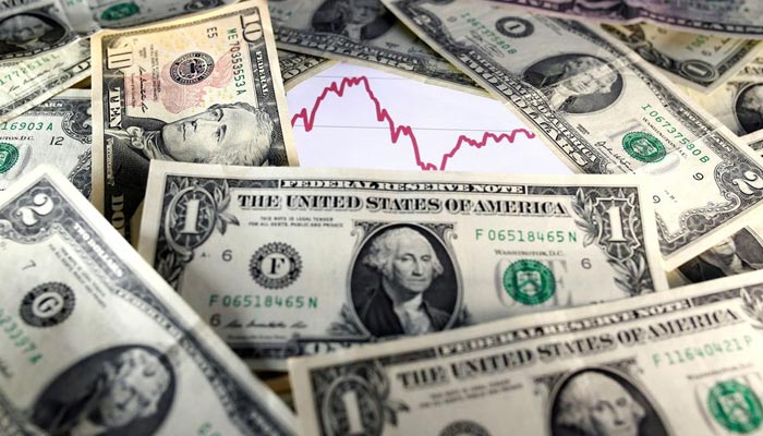 US dollar notes are seen in front of a stock graph in this November 7, 2016 picture illustration. — Reuters/File
