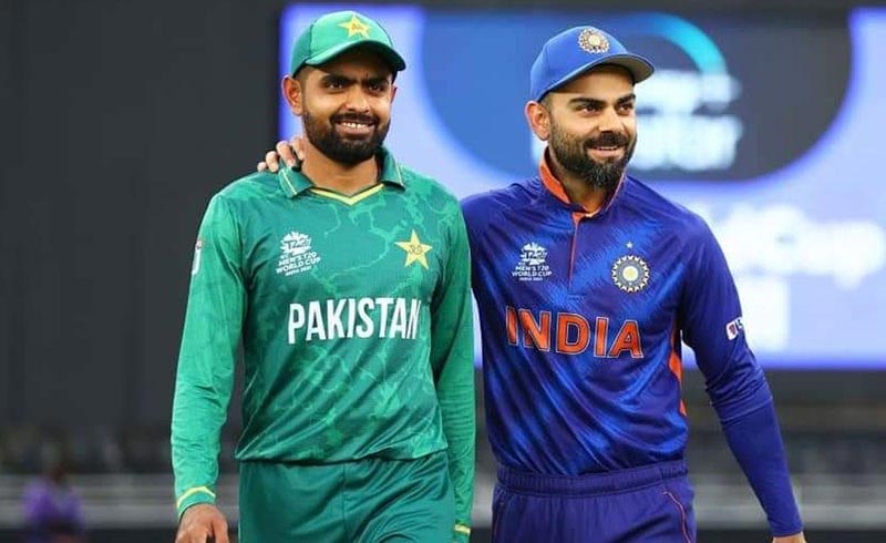 Skipper Babar Azam with Indian batter and former captain Virat Kohli. — Reuters