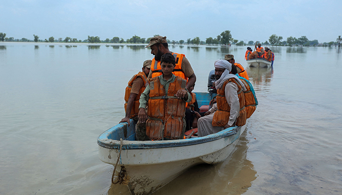 Soldiers of Pakistan army rescue people from the flood-affected Rajanpur district, in the Punjab province of Pakistan, on August 2, 2022. — AFP