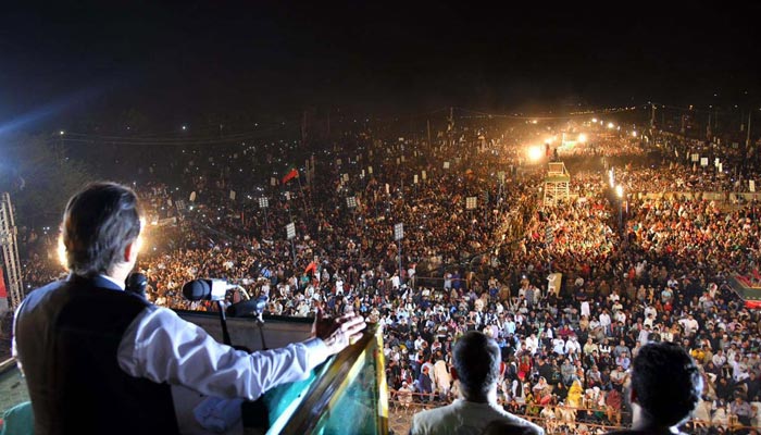 PTI chairperson Imran addressing his supporters at Parade Ground in Islamabad on March 27, 2022. — PID