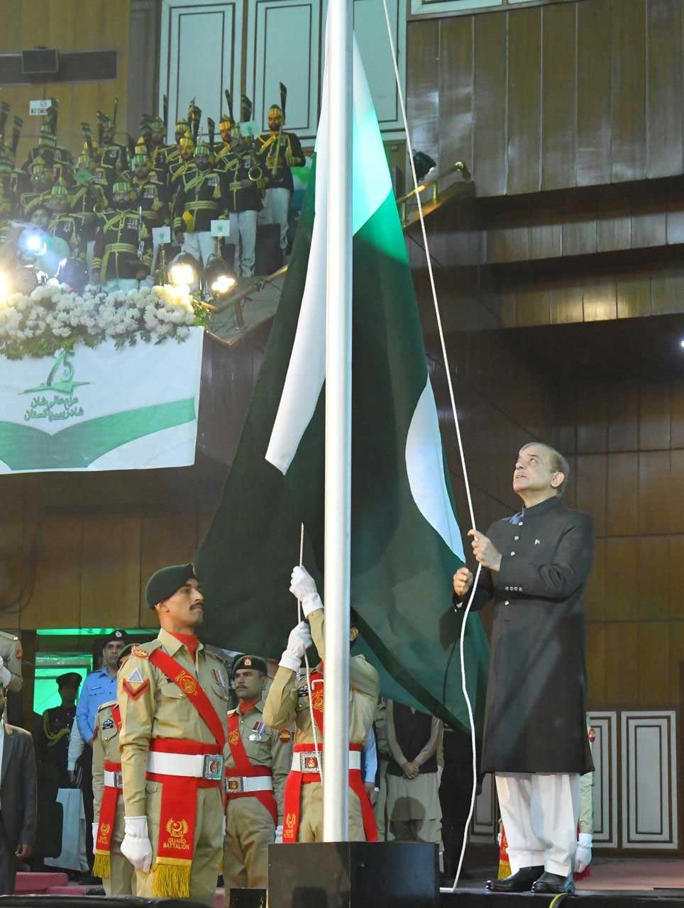 Prime Minister Shehbaz Sharif is hoisting the national flag.