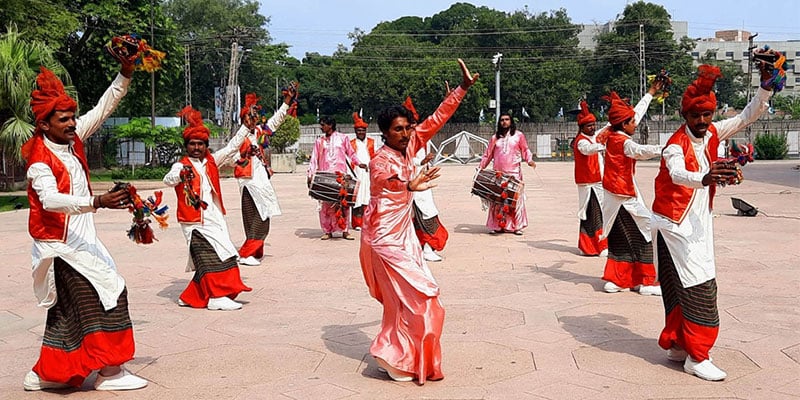Dancers perform during a celebration. — APP