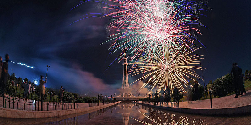 People watch beautiful fireworks amid celebrations. — Online