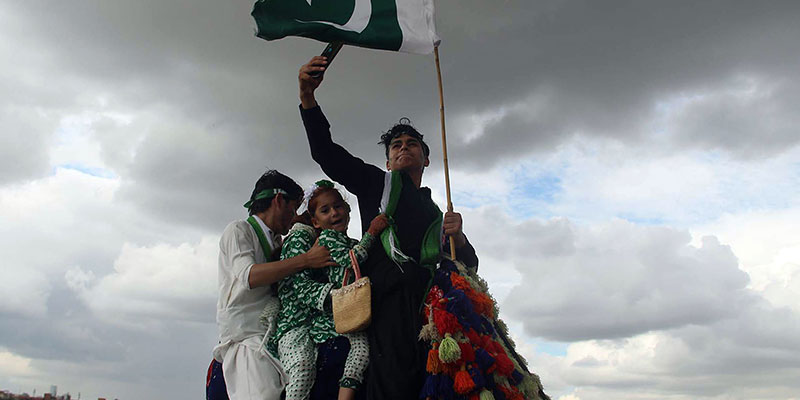 Children enjoy a camel ride on Independence Day. — Online