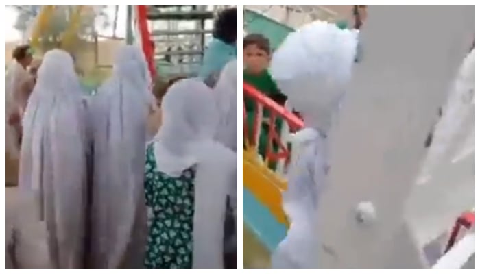 Women and children getting on a ride in a park in Lakki Marwat, on August 14, 2022. — Twitter/File