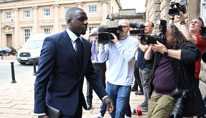 Manchester City and France footballer Benjamin Mendy arrives to Chester Crown Court in northwest England on August 15, 2022. — AFP