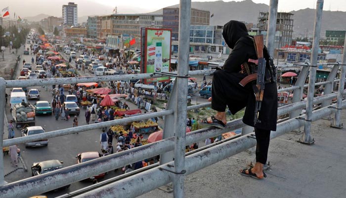 A Taliban fighter stands guard on a bridge in Kabul, Afghanistan, August 6, 2022. — Reuters/File