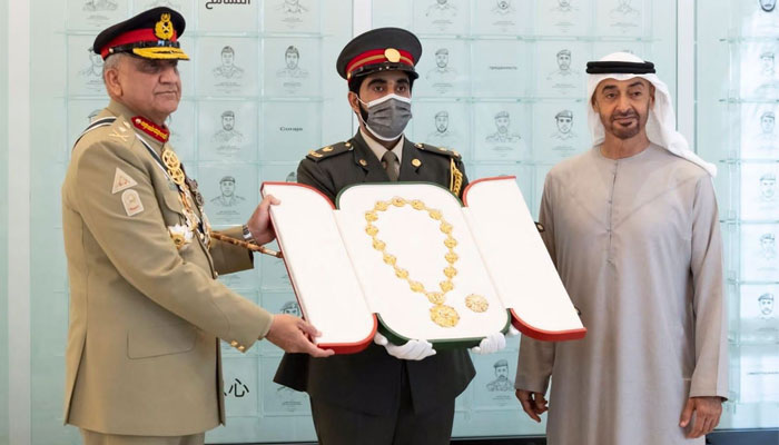 COAS General Qamar Javed Bajwa (from left to right), a UAE official, and UAE President Mohammad bin Zayed. —