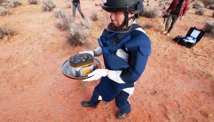 Hayabusa-2 returned to Earths orbit two years ago to drop off a capsule containing the sample. — AFP