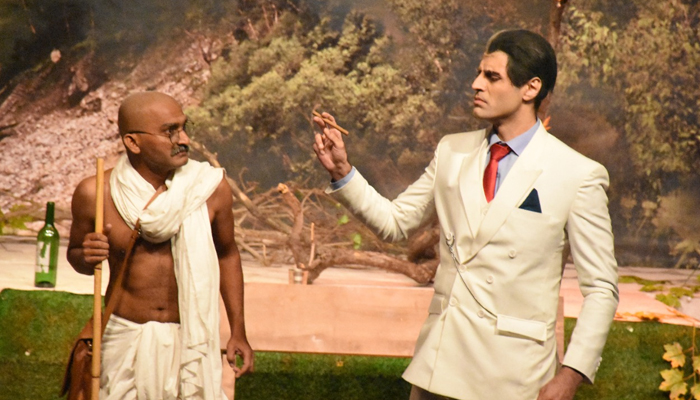 Artists play the characters ofIndias founding father Mahatma Gandhi (left) andQuaid-e-Azam Muhammad Ali Jinnah during the theatre play Saadhay 14 August in Karachi, on August 16, 2022. — Arts Council