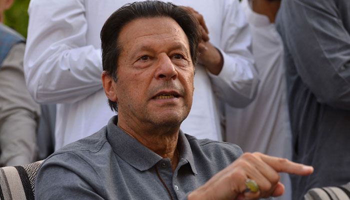 PTI Chairman Imran Khan addressing a press conference at his Banigala residence. — AFP/File