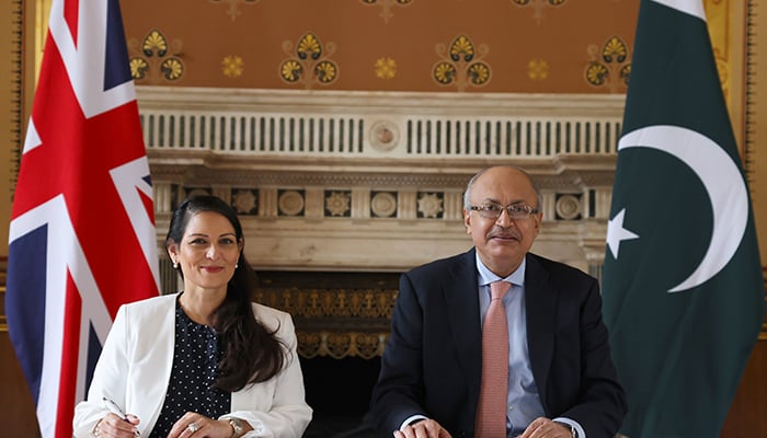 UK Home Secretary Priti Patel (left) and Pakistan’s Interior Secretary Yousaf Naseem Khokhar signing a reciprocal agreement in London, United Kingdom, on August 17, 2022. — Twitter/pritipatel
