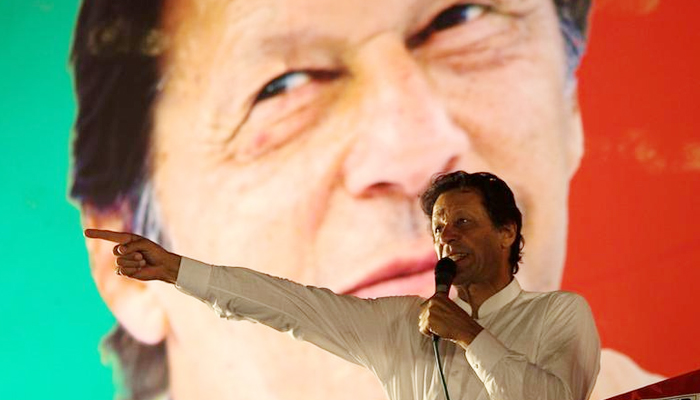 Imran Khan, chairman of the Pakistan Tehreek-e-Insaf (PTI) gestures while addressing his supporters during a campaign meeting ahead of general elections in Islamabad, Pakistan, July 21, 2018. — Reuters