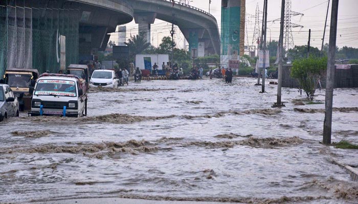 A file photo of waterlogging in Karachi. — APP/File