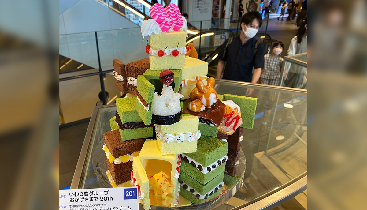 This photo taken on August 17, 2022 shows plastic food samples in preparation for an exhibition hosted by Japan´s Iwasaki Group in Tokyo.