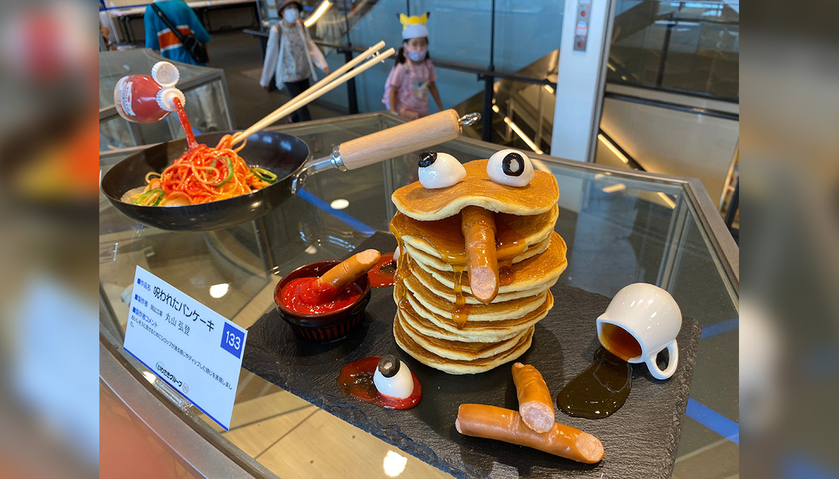 This photo taken on August 17, 2022 shows plastic food samples in preparation for an exhibition hosted by Japan´s Iwasaki Group in Tokyo. — AFP