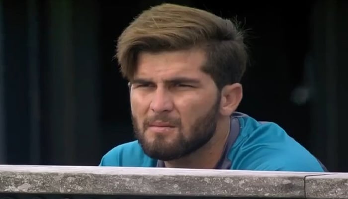 Pacer Shaheen Shah Afridi sits on the benches in this undated photo. — Twitter/HighonCric