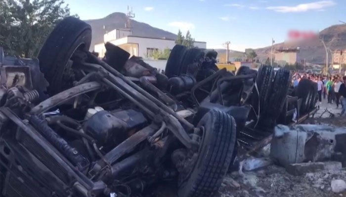 A video grab taken from AFP TV footage on August 20, 2022 shows a truck after a crash in the Derik district of Turkeys Mardin, which killed at least 19 people. — AFP