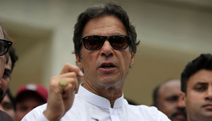 Cricket star-turned-politician Imran Khan, chairman of Pakistan Tehreek-e-Insaf (PTI), speaks to members of media after casting his vote at a polling station during the general election in Islamabad, Pakistan, July 25, 2018. — Reuters/File