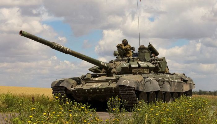 A tank of Russian troops drives in Russian-held part of Zaporizhzhia region, Ukraine, July 23, 2022. —  Reuters